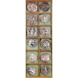 A collection of twelve silver buttons mostly early 19th Century, all with figures or heads, some