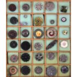 A collection of thirty five buttons, late 19th Century/early 20th Century including glass