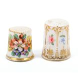 Two 19th Century English porcelain thimbles comprising a tall example painted with colourful