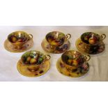 A group of five Royal Worcester Tea Cups and Saucers painted with fruit by various artists including