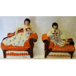 A pair of 19th Century Staffordshire Pottery figures of male and female musicians each reclining