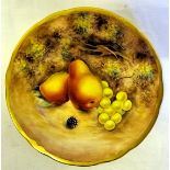 A Tea Plate painted with fruit by Gerald Delaney. 6 1/2" (16cms) dimeter.