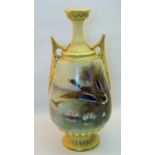 A Royal Worcester two handled baluster Vase painted with mallards in flight within a blush ivory