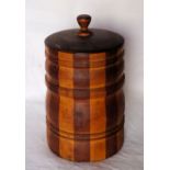 A treen cylindrical Jar and Cover. 8" (20cms) high.