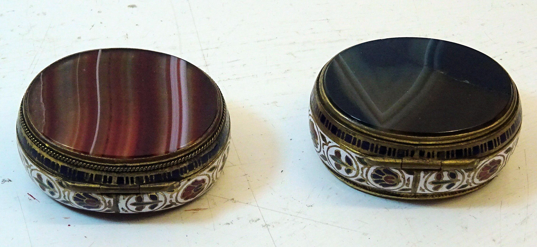 Two enamel and agate oval Boxes. (one damaged)