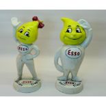 A pair of novelty cast metal Esso male and female Money Boxes. 10" (26cms) high.