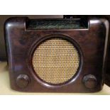 A Bush D.A.C. 90 mains Radio in brown Bakelite radio.