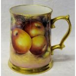 A bone china Mug painted with fruit by the ex Worcester Gerald Delaney with gilt handle and foot. 5"