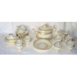 An early 19th Century Spode Teaset decorated with gilt sprigs, scrolls etc. comprising eight