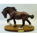 A Beswick Horse 'Spirit of Earth', no. 2914, in matt brown finish and on a wooden base.