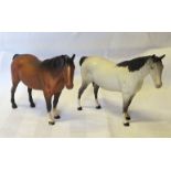 A Beswick model of a Mare, no. 1991, second version, in grey matt finish, and another in brown