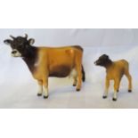 A Beswick model of Jersey Cow, no. 1345 and a Jersey calf, no. 1249d.