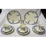 A Barker Brothers Teaset of Art Nouveau design, decorated with stylised flowers in blue and white,