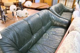 Pair of green leather sofas