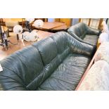 Pair of green leather sofas