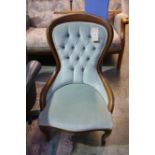 Green button back chair