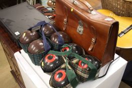 2 Sets of bowling balls and a satchel