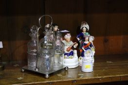 Various Staffordshire figures and a cruet