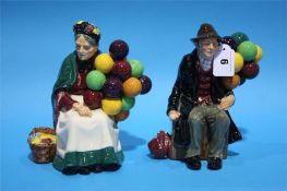 A Royal Doulton 'Balloon Seller' and 'Balloon Man'