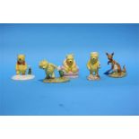 Five Royal Doulton 'Winnie the Pooh' figures.