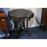 Ebonised octagonal occasional table, 61cm wide.