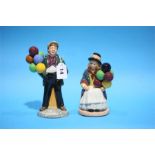 Two Royal Doulton figures 'Balloon Girl and Boy'.