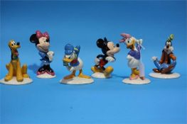 Six Royal Doulton Disney figures.