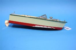 A small model speed boat.  30 cm long