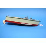 A small model speed boat.  30 cm long