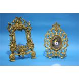 Two ornate gilt easel frames.