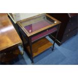 A mahogany bijouterie cabinet. 56cm wide.