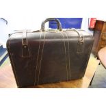 A 1950's leather suitcase.