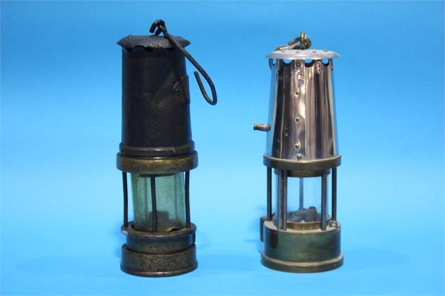 Two Miner's lamps.