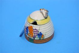 A small Clarice Cliff Crocus pattern beehive prese