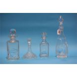 Four glass decanters.