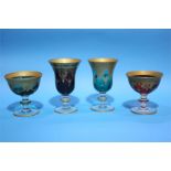 Four Venetian glasses.