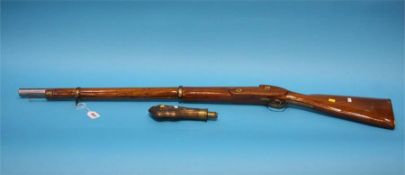 A reproduction percussion rifle.