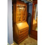 A Yew wood bureau bookcase, 75cm wide.