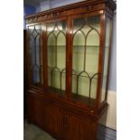 Reproduction glazed mahogany 3 door bookcase, 139