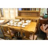 An oak 'Lees' type dining room suite, comprising s