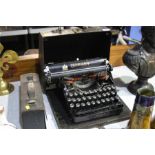 Typewriter and a set of chemistry bottles