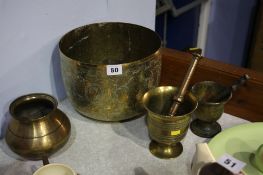 Two brass pestle and mortar etc.