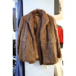 Two 1/2 length fur coats