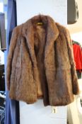 Two 1/2 length fur coats