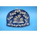 A Victorian beadwork tea cosy.