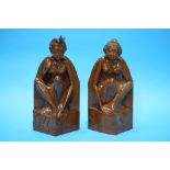 Pair of carved Indonesian wooden figures.