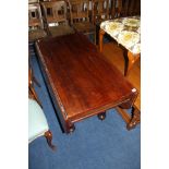 A Victorian mahogany drop leaf dining table.