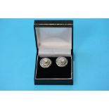 A pair of solitaire diamond earrings, two main sto