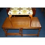 A square topped stool and a coffee table.