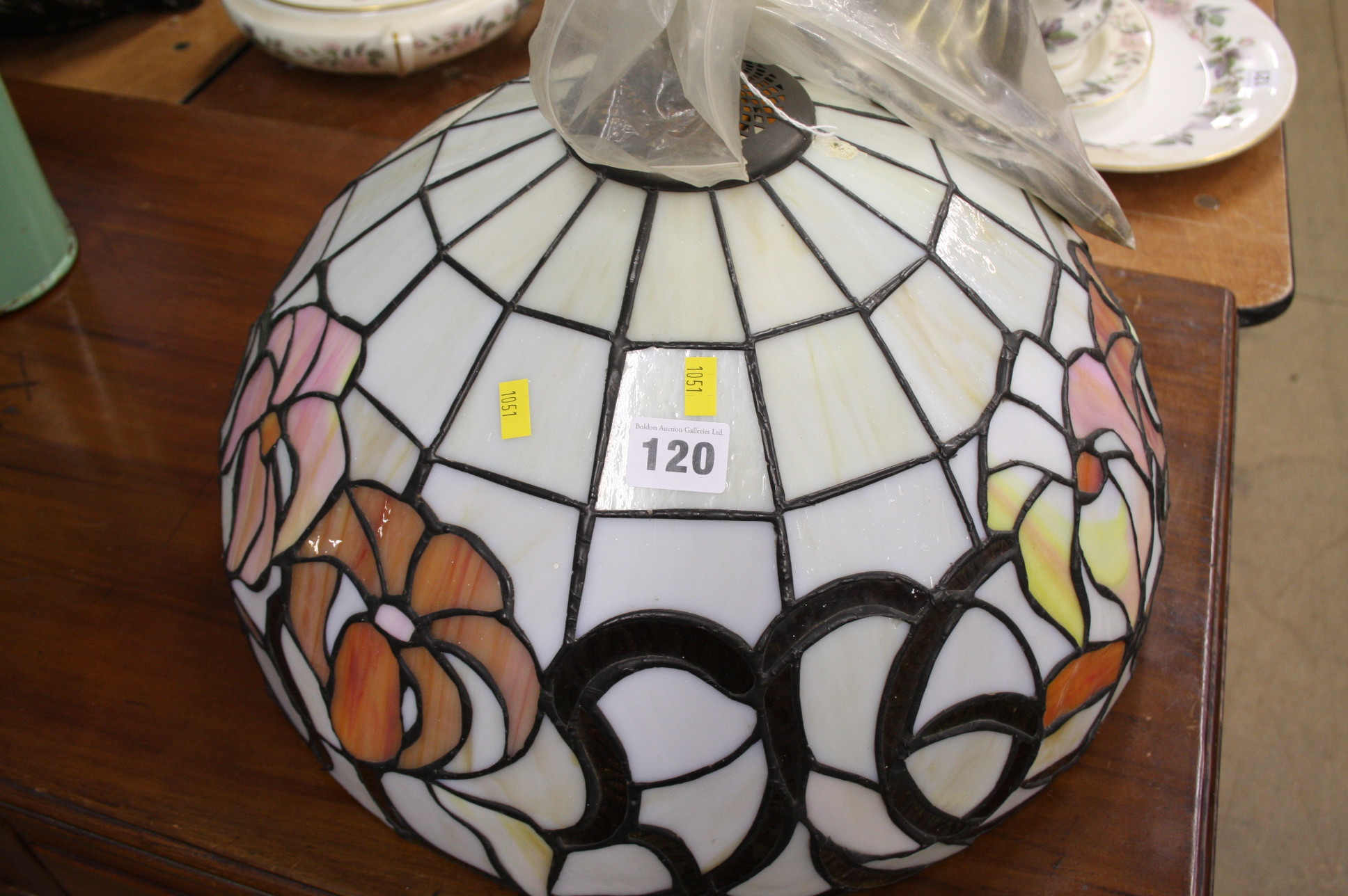 A Tiffany style glass shade.